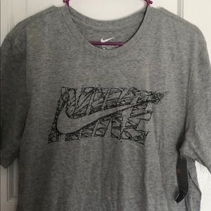 The Nike tee size large